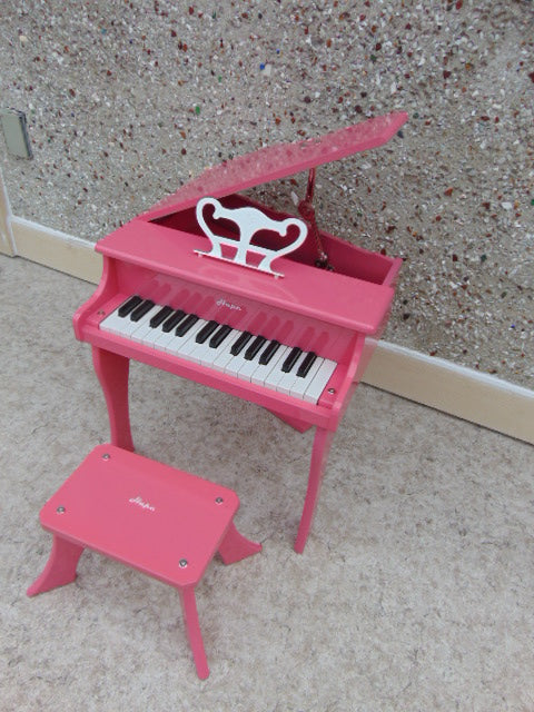 Happy grand piano sales pink