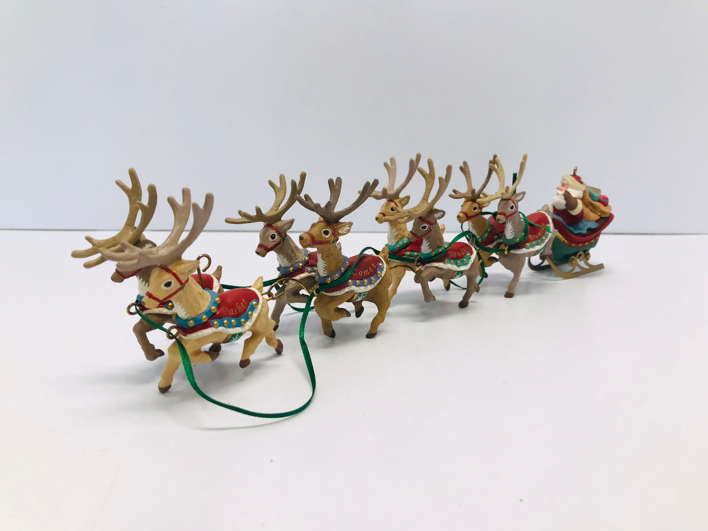 Christmas Ornaments Santa and His Team Of Reindeers 14" long  Genly Used