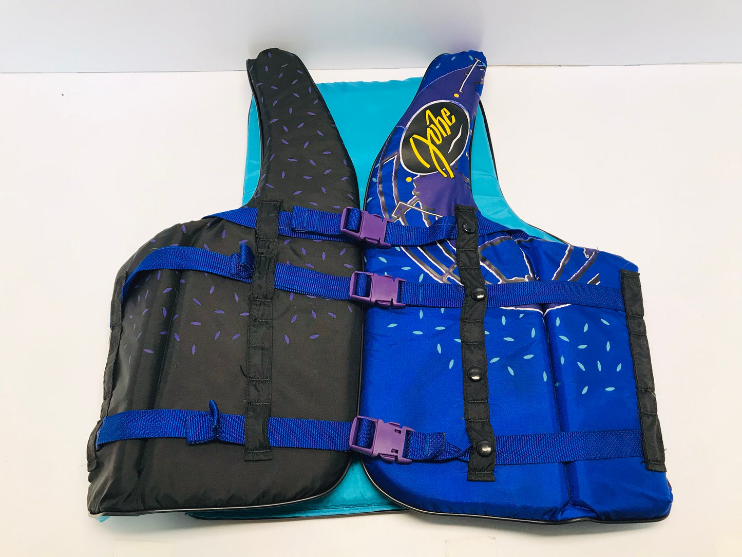 Life Jacket Adult Size X Large Jobe 3 Buckle  Surf, Ski Water Sports Purple Teal Black Excellent