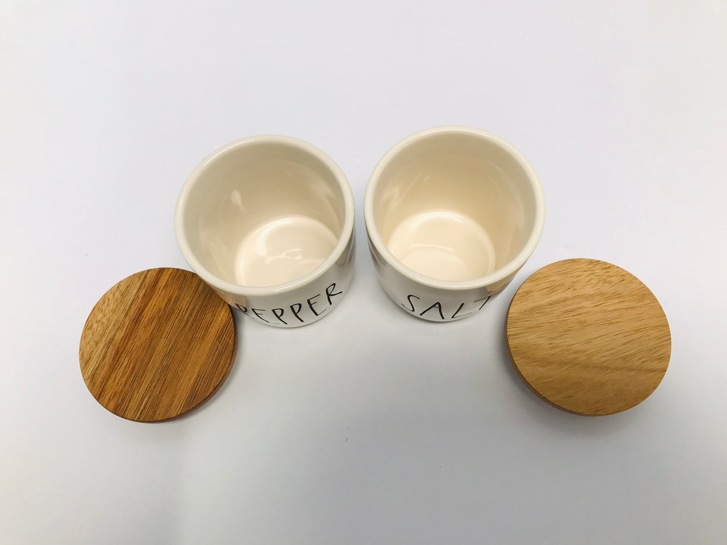 RAE DUNN Kitchen 2 pc Salt Pepper Wood Tops Hold 1 cup