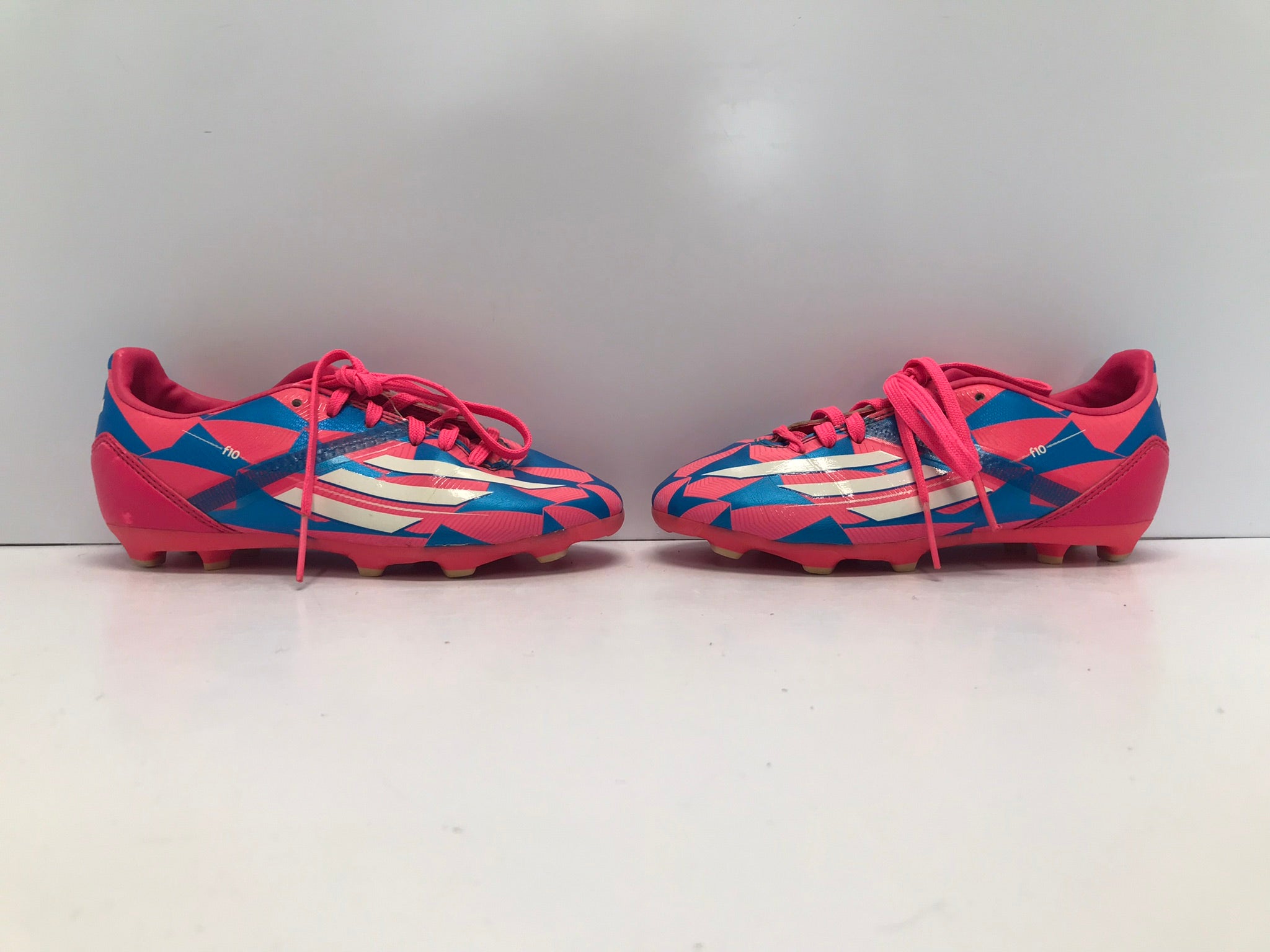 Pink and blue adidas soccer clearance cleats