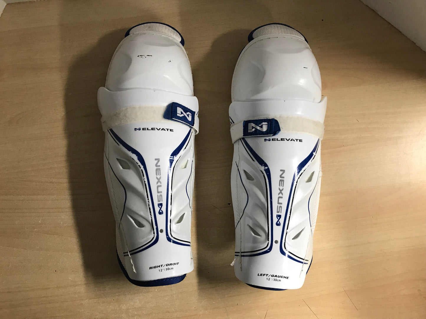 Hockey Shin Pads Child Size 12 inch Bauer Nexus Calf Wrap White Blue Excellent