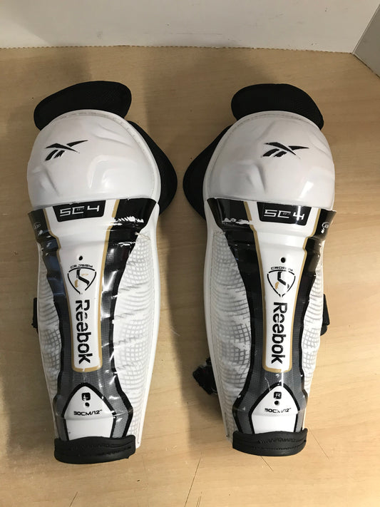 Hockey Shin Pads Child Size 12 inch Reebok White Black Gold